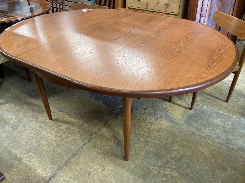 A G Plan teak extending dining table, 168cm extended, width 121cm, height 73cm and six chairs